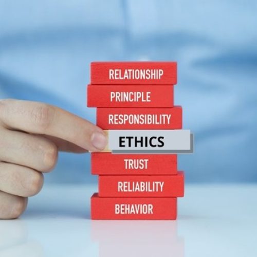 Surrogacy done ethically with man pushing out a block with the title Ethics